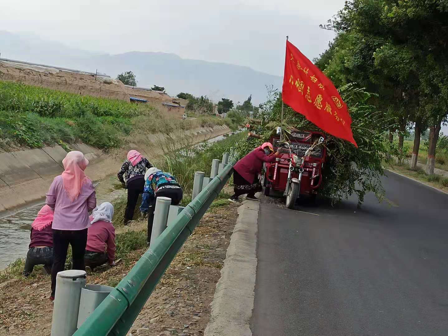 1630662217784366.jpg 巾帼志愿者.jpg